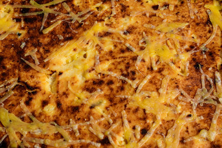 Freshly cooked traditional sweet cheese pie in display for sale at a weekend street food market in...