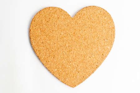 One heart shape made from of light brown cardboard, isolated on white with space for textの写真素材