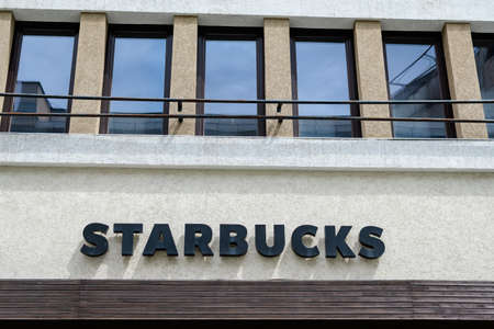 Bucharest, Romania - June 6, 2020: Entry sign with logo for Starbucks cafe locationのeditorial素材