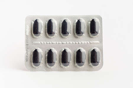 Many medicine pills, tablets and vitamins isolated on white background, pharmaceutical picture taken with soft focusの写真素材