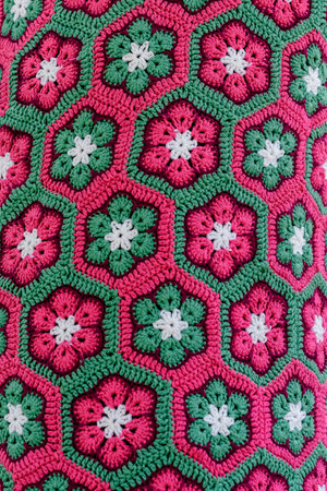 Vivid multi colored background of beautiful knitted threads displayed for sale at a clothing store