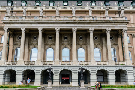 Budapest, Hungary, 6 August 2019: Tourists walking in the area of Buda Castle or Royal Palace historical landmark in the castle district near the Danube river in a sunny summer dayのeditorial素材
