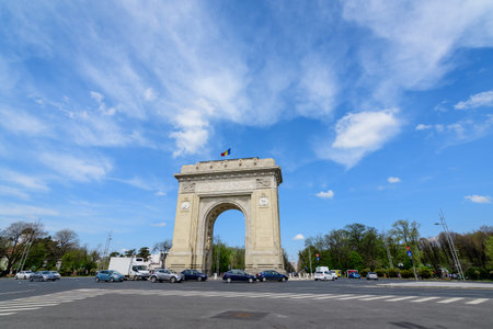 Bucharest, Romania, 24 April 2021: Arcul de Triumf (The Arch Of Triumph) is a triumphal arch and...
