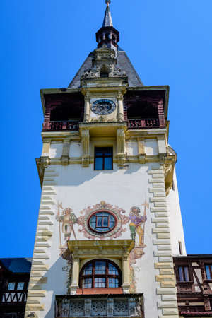 Beautiful neo-Renaissance building of Peles Castle (Castelul Peles) near Bucegi Mountains (Muntii Bucegi) in a sunny summer day in Sinaia town, Romaniaのeditorial素材