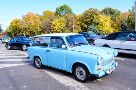 Bucharest, Romania, 24 October 2021: One vivid blue Trabant German vintage classic car in traffic in a street in the city center, in a sunny autumn dayのeditorial素材