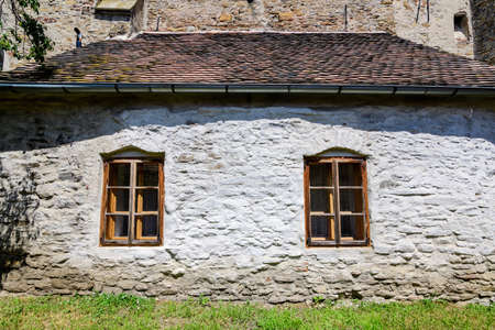 Old building of the fortitied Church in Axente Sever village in Sibiu county, in Transylvania (Transilvania) region of Romania, in a sunny summer dayのeditorial素材