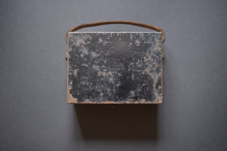 Vintage wooden carrying case for a historic measuring device, representing retro scientific equipment.の写真素材