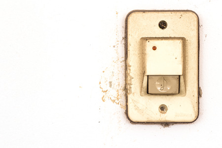 Old electric bell installed in a home.の写真素材