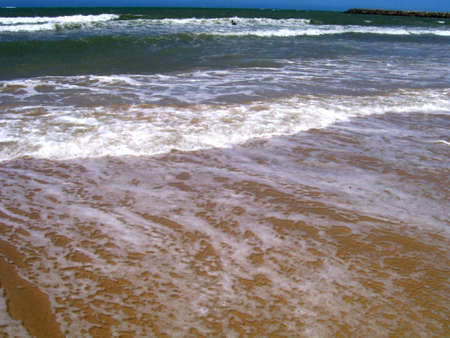 smooth and frothy waveの写真素材