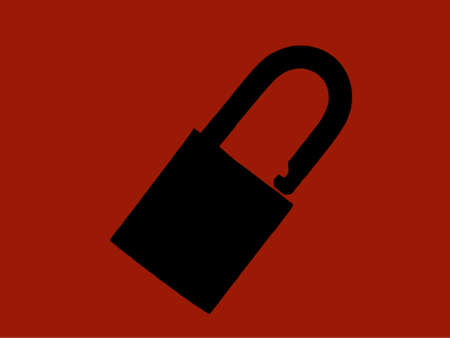 Black padlock on red backgroundの写真素材