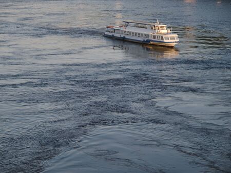 Pleasure boat on a riverの写真素材