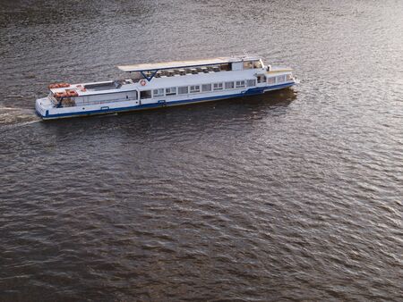 Pleasure boat on a riverの写真素材