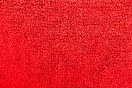 Abstract natural textile background - red fluffy towel.の写真素材