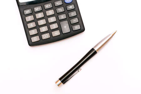 Business abstract - isolated calculator and elegant pen.の写真素材