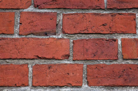 Rugged red brick wallの写真素材