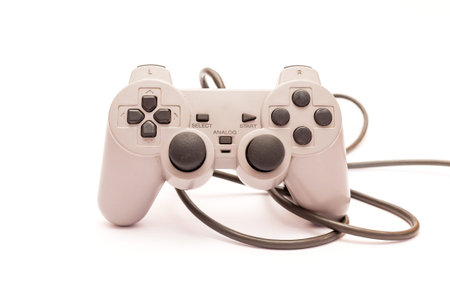 Old gamepad isolated on a white background.