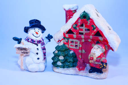 Little snowman welcomes winter.の写真素材
