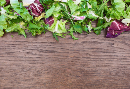 Healthy vegetables on an old wooden table background copy space.の写真素材