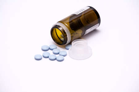 Glass bottle with pills.の写真素材