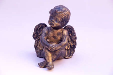Angel figurine on white background.の写真素材