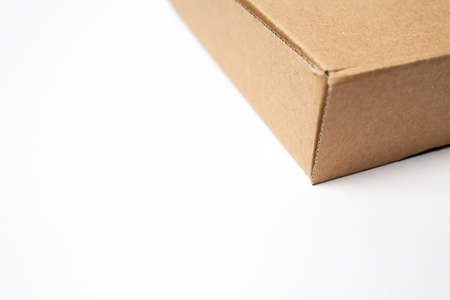 Brown carton cardboard package box isolated white background.の写真素材
