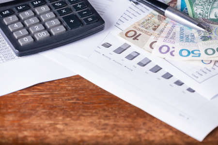 Calculator money statistics papers pen business boss conceptの写真素材