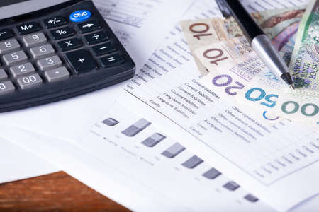 Calculator money statistics papers pen business boss conceptの写真素材