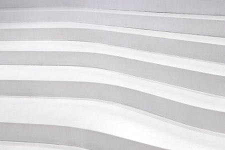 Modern white stairs as an abstract background concept.