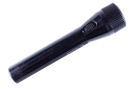 Old scratched black flashlight isolated on white background.の写真素材