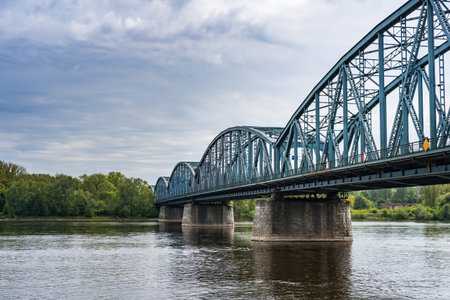 Truss road bridge over Vistula river in Torun, Poland. Wide shot.の写真素材
