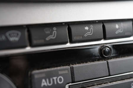Closeup view on air conditioning panel in a car. Shallow depth of field.の写真素材