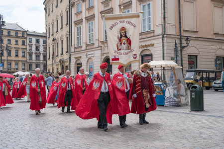 Krakow, Poland - July 2, 2019:  People on Corpus Christi (God's Body) procession on a Main Square in...