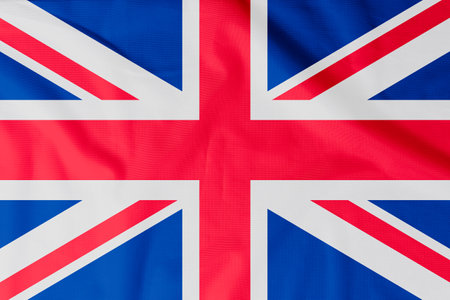 Flag of United Kingdom of Great Britain and Northern Ireland (UK) with natural material creases as a backgroundの写真素材