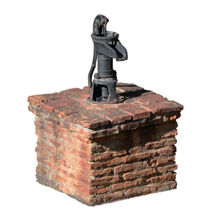 artesian well crafted with a manual pump for the removal of the waterの写真素材