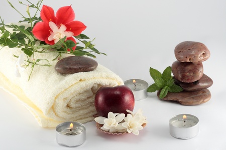 concept of spa whit stone fruit jasmine towel lily mint and candlesの写真素材