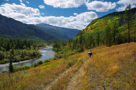 river, mountains and skiesの写真素材