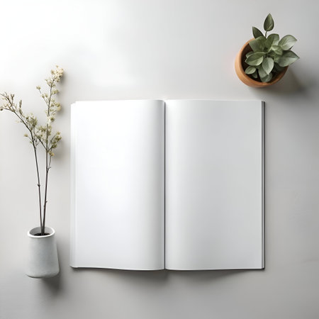 A clean. minimal mockup featuring an open blank book on a white background. flanked by two potted plants. Perfect for showcasing your branding. quotes. or product designs.の素材