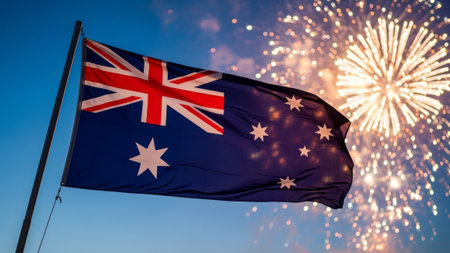Australian flag and fireworks against blue skyの素材