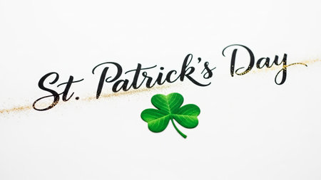 St. Patrick's Day text and shamrock, white background, festive celebration.の素材