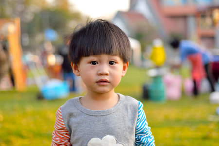 Young boy looking at camera