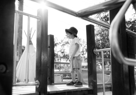 Child Playing on Playgroundの写真素材
