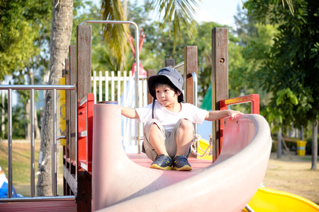 Happy child on playgroundの写真素材
