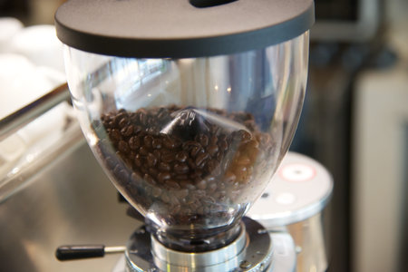 Close up coffee beans in machine