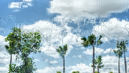 Water fall and clouds blue sky backgroundの写真素材