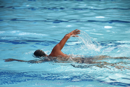 Man swimming in a swimming poolの写真素材
