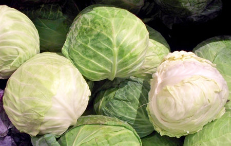 Cabbages on display in a market 