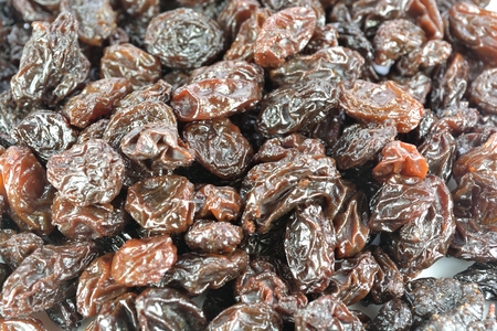 A closeup of a group of raisins..の写真素材