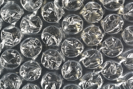 Closeup of bubble wrap suitable for backgrounds, textures and layers.の写真素材