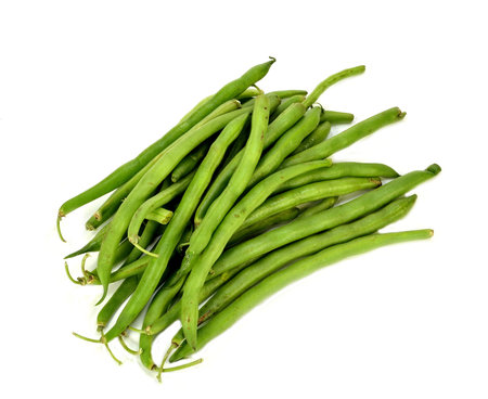 Group of green beans on a white.