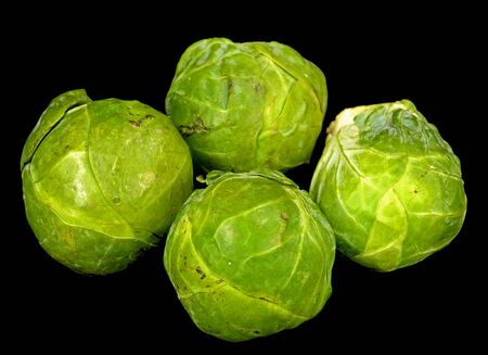 Brussel sprouts on a black background.の写真素材